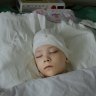 Inside a Kharkiv hospital, a family waits for a wounded boy to wake up