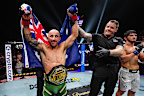Alexander Volkanovski of Australia reacts after a victory against Movsar Evloev of Russia.
