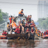 Residents in Zhuozhou, China, are evacuated from the flood-hit city. 