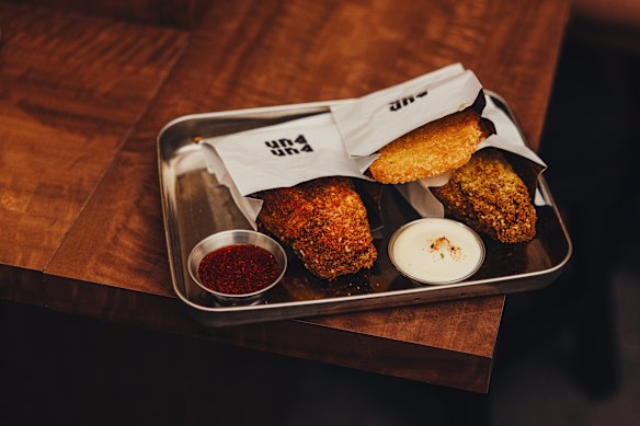 Sesame fried chicken and hash brown. 