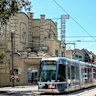 The 109 tram passes the Palace Cinemas Balwyn on Whitehorse Rd.