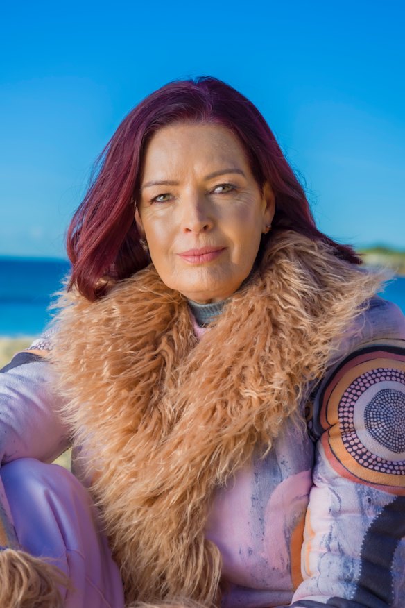 After starting a relationship with Stan Grant, Holmes says she had a “rude awakening” to the issues of race in Australia.