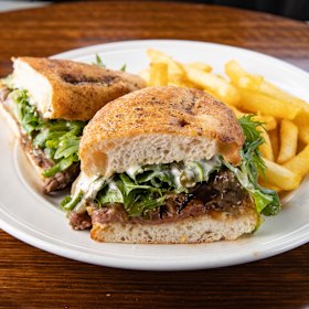 Steak sandwich with cheese, caramelised onion,
rocket and mustard mayonnaise.