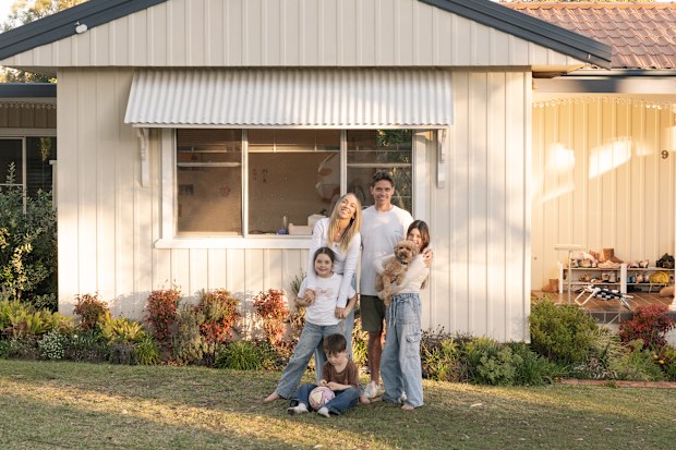 Rachel and Ryan Carr and their three kids at their Oyster Bay home.
