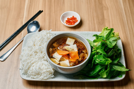 Quan Lua’s bun cha is a DIY plate of pork, broth, noodles and herbs.