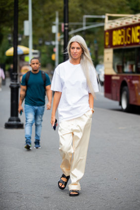 British Vogue deputy editor Sarah Harris demonstrates the trend during New York Fashion Week.