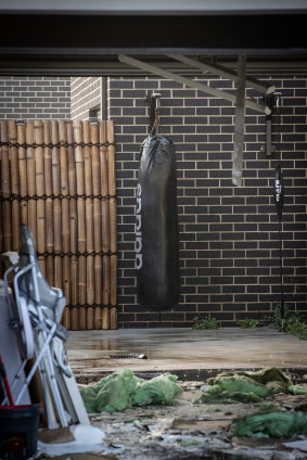 A punching bag amid the charred remains of Sam Abdulrahim’s old home.