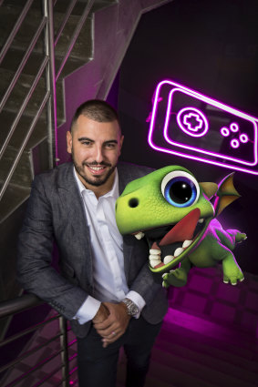 Gerry Sakkas of PlaySide studios with an augmented reality dragon from AR Dragon. 
