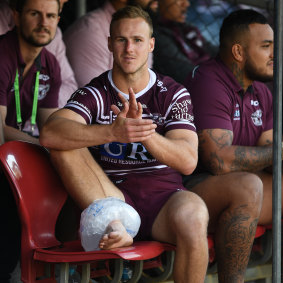 Cheer squad: Daly Cherry Evans was relegated to watching his side complete the comeback against Canberra.