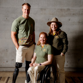Paralympic athletes Curtis McGrath and Angie Ballard model the RM Williams-designed Paris 2024 uniform with chef de mission Kate McLoughlin (right).