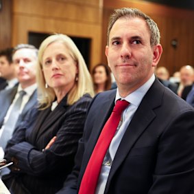 Finance Minister Katy Gallagher and Treasurer Jim Chalmers watch the PM speak on Wednesday.