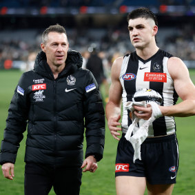 Craig McRae in conversation with Maynard after Collingwood’s win over Geelong last month.