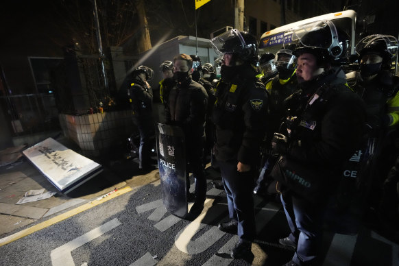 Police outside the court on Sunday.