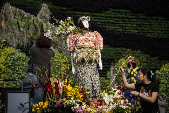 Finishing touches being applied to the Nancy Bird Walton floral tribute on show at The Calyx in the Royal Botanic Gardens.