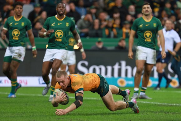 Australia’s Max Jorgensen scores a try.