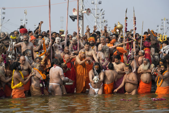 Naga Sadhus or naked Hindu holy men, gather to take a holy dip on Mauni Amavasya or “new moon day”, during the Maha Kumbh festival.