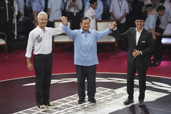 Subianto (centre) at last month’s first presidential debate with fellow candidates Ganjar Pranowo (left) and Anies Baswedan.