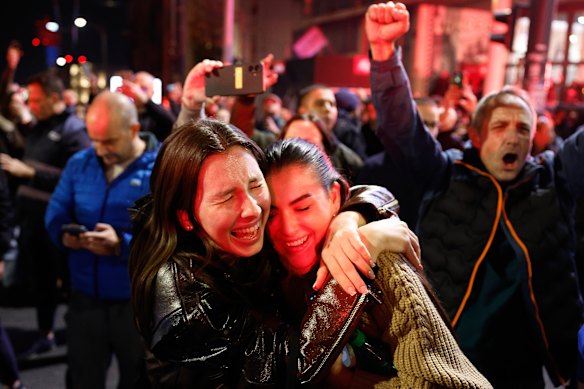 Young Serbs express their joy.