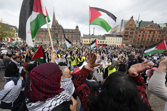 People wave Palestinian flags during protests in Eurovision host city Malmo, Sweden, ahead of the secnd semi-final.