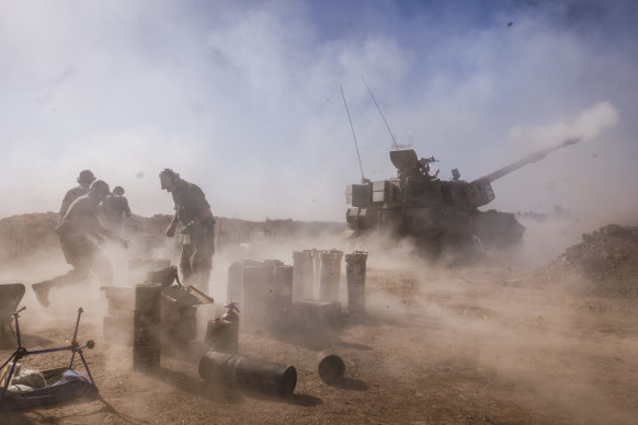 An Israeli artillery unit fires from the Israeli side of the border towards the Gaza Strip on the weekend.