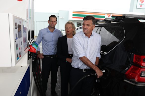 Opposition Leader Angus Taylor at the bowser on Friday morning.