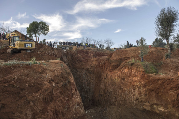 Civil defense and local authorities dig in a hill as they attempt to rescue a 5 year old boy who fell into a hole near the town of Bab Berred near Chefchaouen, Morocco.