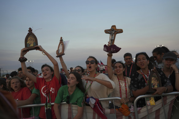 Young people flock together at Parque Tejo in Lisbon for a vigil with Pope Francis on Saturday.