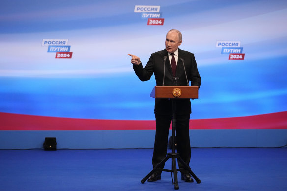 Russian President Vladimir Putin  speaking at his campaign headquarters after his election win.