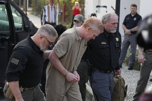 lex Murdaugh is led to the Colleton County Courthouse by sheriff’s deputies for sentencing.