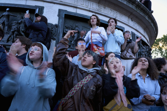 Protesters shout anti-fascist slogans protesting against far-right gains in the European elections in June.