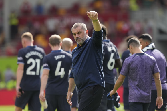 Ange Postecoglou waves to Spurs fans at the end of the match against Brentford. 