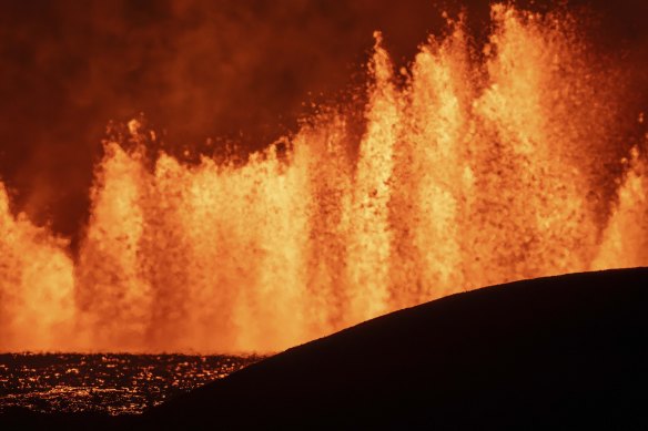 View of the lava fountains pouring out from the new eruptive fissure opened at Svartsengi volcanic system, Iceland, this week. The fissure is 3km north of Grindavik.