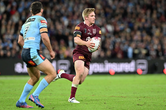 Tom Dearden in action for the Maroons.