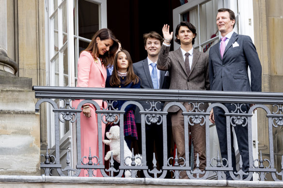 Count Nikolai, second from right, with his family, father Prince Joachim of Denmark, Princess Marie (in pink), Count Henrik (behind), Count Felix, and Countess Athena at Amalienborg Palace.