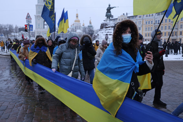 People rallying in patriotic support of Ukraine on Unity Day on Saturday in Kyiv, Ukraine.