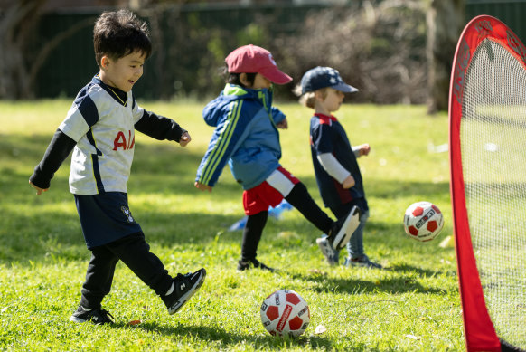 Preschoolers take part in the Little Kickers soccer training program in Concord on Friday.