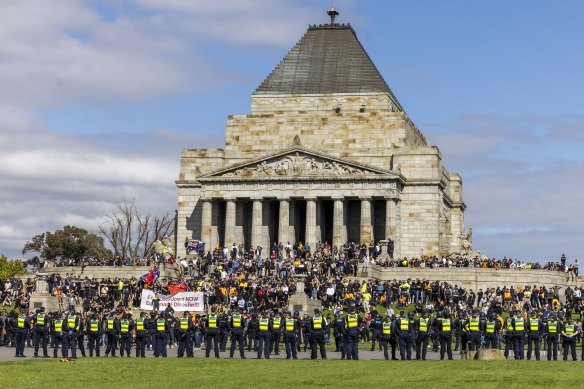 Police respond to protests by construction workers at the Shrine of Remembrance today.