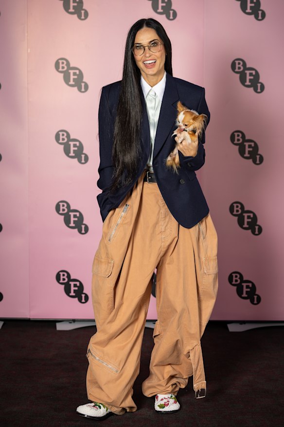 Demi Moore (pictured with her chihuahua, Pilaf) nails the barrel-leg and cinched-blazer combo at a London film screening.