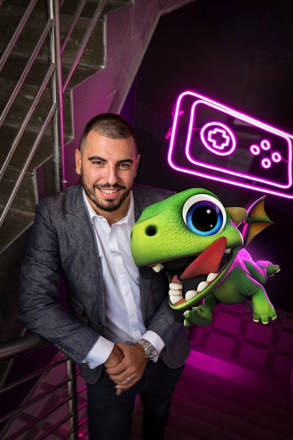 Gerry Sakkas of PlaySide studios with an augmented reality dragon from AR Dragon. 