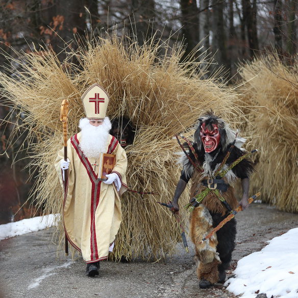 In southern Germany, Saint Nicholas and a scary Krampus step out to meet villagers, accompanied by a local creature in straw called Buttnmandl or Shaking Man, who drives away evil spirits and wakes up nature.
