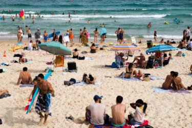 People enjoying Bondi on a hot Sunday afternoon in March. It was the sixth-hottest March on record for NSW.
