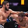 Islam Makhachev trades punches with Jack Della Maddalena in the UFC welterweight championship fight in the US last November.