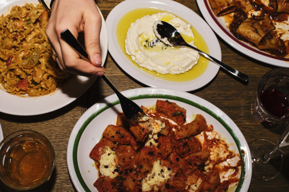 Rigatoni arrabbiata comes with wood-fired chilli, stracciatella and olive.