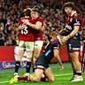 Huw Jones of the British & Irish Lions celebrates scoring a try 