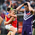 Kai Lohmann of the Lions and Dayne Zorko of the Lions celebrate.