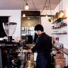 Owner and founder Arnun Wattanaporn behind the counter at Kaizen.