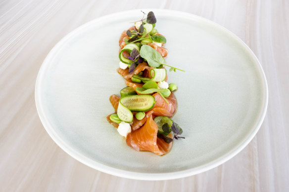 A plate of ocean trout carpaccio is dressed with “bibs and bobs”.