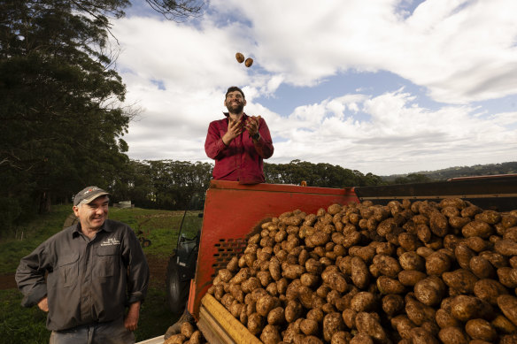 Jon Hill with his son Ryan Hill on their potato farm in Wildes Meadow in NSW. 