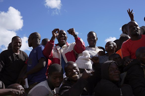 Prisoners celebrate after being released from Chikurubi Maximum prison on the outskirts of the capital Harare. Zimbabwe President Emmerson Mnangagwa has granted amnesty to more than 4,000 prisoners in an independence day amnesty.