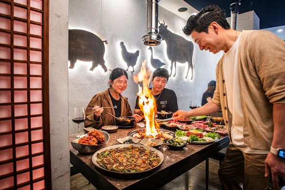Yori owner Jackie Park helps out on the grill.